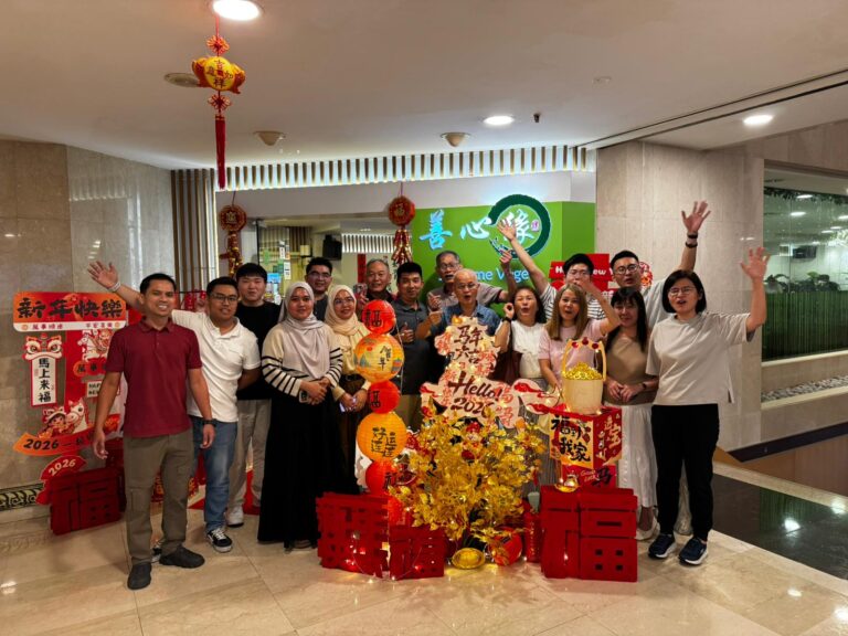 Celebrating Chinese New Year 2026 at MingDeng Singapore 3 Chinese New Year office celebration at MingDeng Singapore with traditional red and gold decorations
